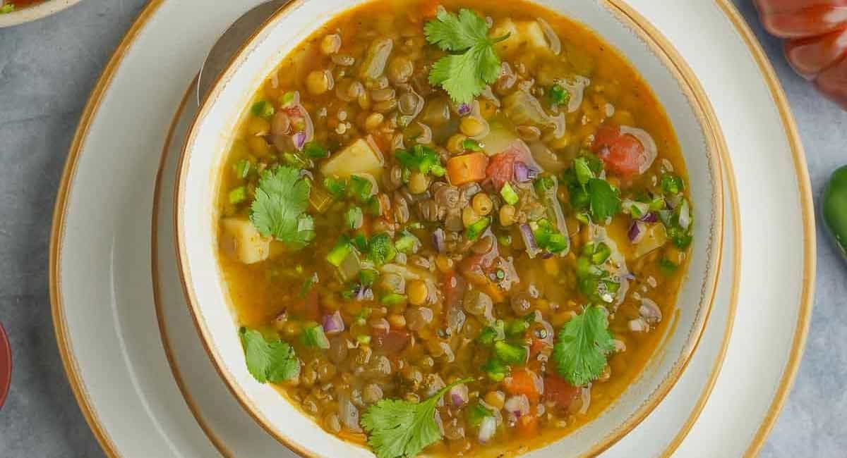 Overhead image of sopa de lentejas (Mexican lentil soup). 