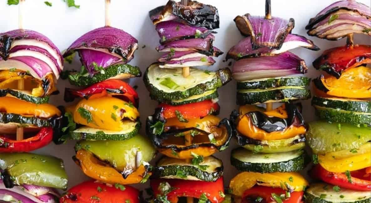 Overhead image of grilled veggie skewers. 