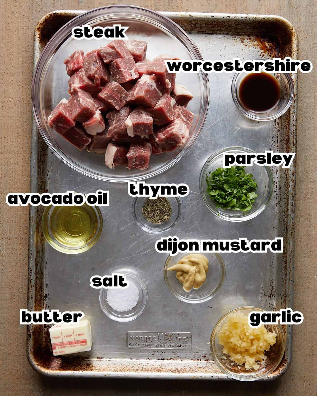 Overhead image of ingredients needed to make garlic butter steak bites.