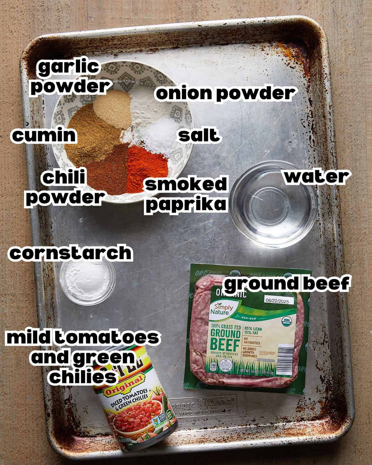 Overhead image of ingredients needed to make beef soft tacos. 