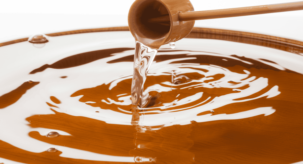 Up close image of mirin being poured. 