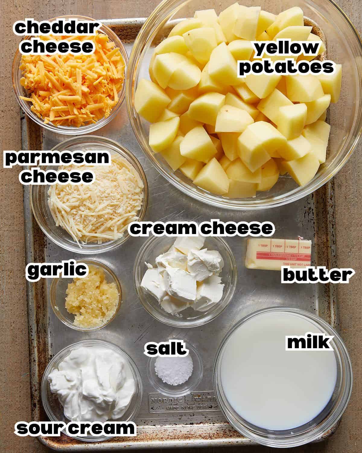 Overhead image of ingredients needed to make cheesy mashed potatoes.