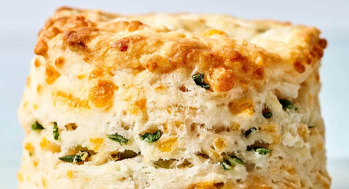 Up close side image of cheddar chive biscuits. 