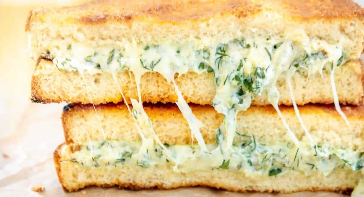 Up close side image of Greek spanakopita grilled cheese. 