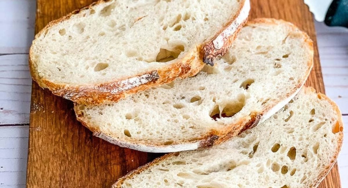 Overhead image of sourdough garlic bread in slices. 