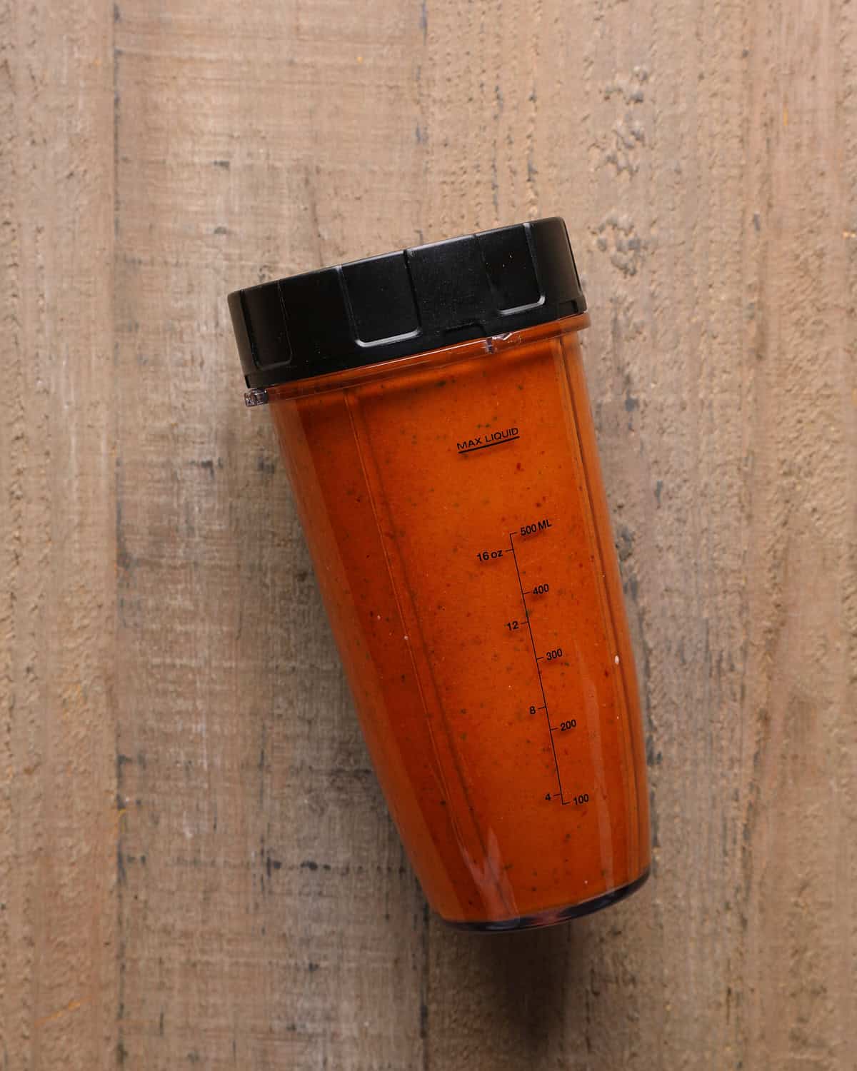 Chipotle hot honey or chipotle lime marinade blended smooth in a blender cup.